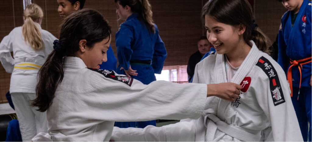 Children celebrate birthday wearing kimono forы judo